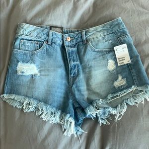 H&M NEW WITH TAGS. Blue jean shorts.